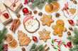 Christmas gingerbread cookies with spices and holidays decorations. Christmas food. Top view image.