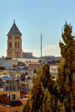 Panoramic View Of Tower Of Lutheran Church Of Redeemer In Christian Quarter And Ancient Rooftops Of Old City Of Jerusalem, Israel. On Sunny Day. From Roof Austrian Hospice Of Holy Family