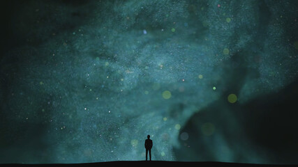 Wall Mural - the human silhouette standing on a dark cloudy background