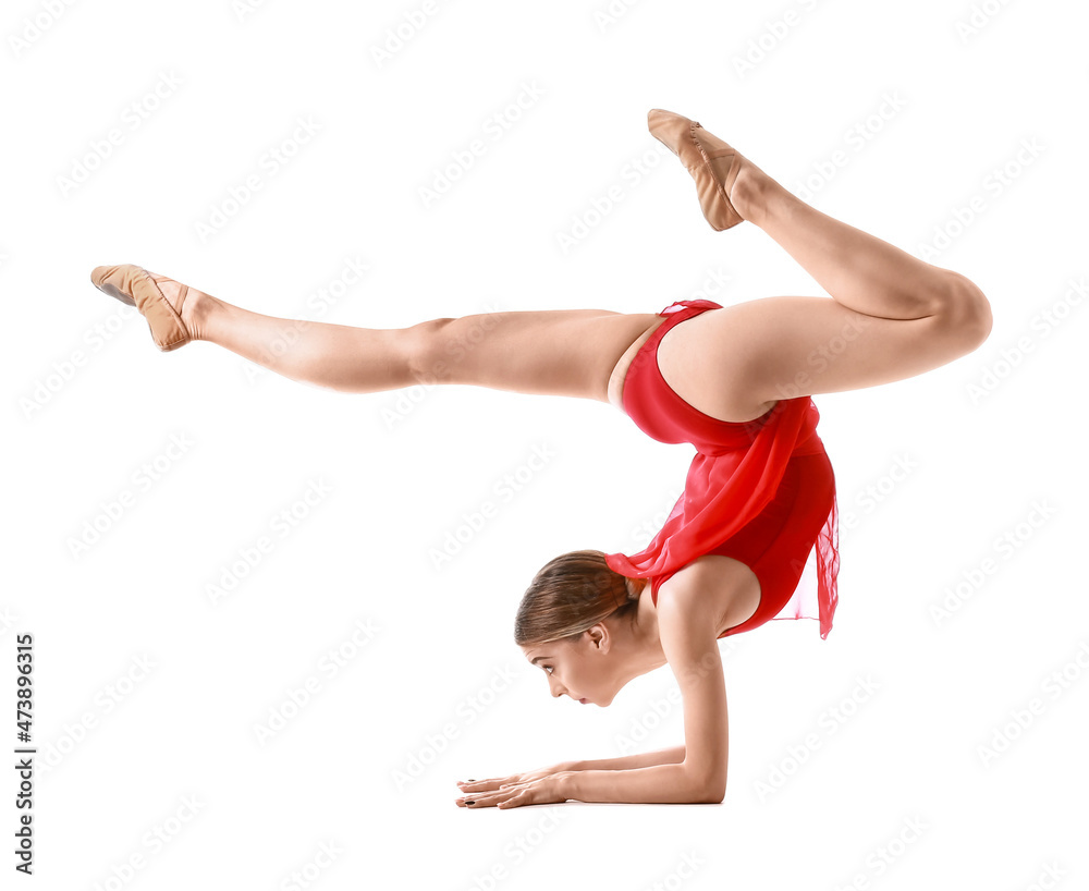 Beautiful young woman doing gymnastics on white background
