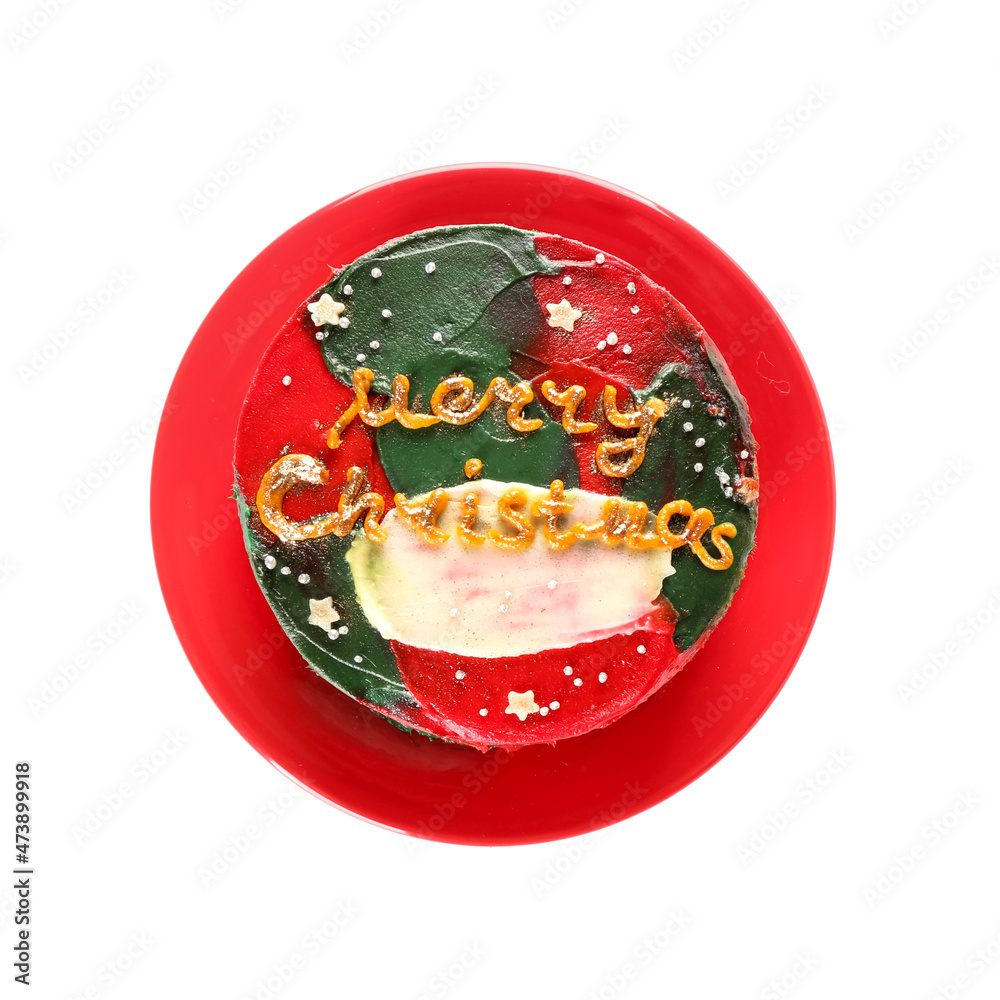 Plate with Christmas bento cake on white background