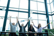 © visoot - Successful business team,Business team celebrating a good job in the office.