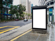 © shurong - Vertical blank billboard ad mock up at a bus stop in the Central Business District of Singapore.