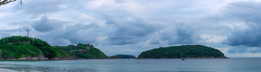 Kata Beach, Kata Noi beach Phuket  with beautiful blues and Greens, turquoise oceans islands mountains boats trees and beautiful resort island of phuket thailand