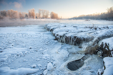 Poster - Frosty Venta river waterfall, the widest waterfall in Europe, in sunny, foggy winter morning, Kuldiga, Latvia