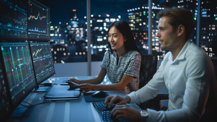 Poster - Financial Analyst Talking to Investment Banker in Late Evening at Work. Chatting About Real-Time Stock Chart Data on Tablet Computer. Businesspeople Have a Meeting in Broker Agency City Office.