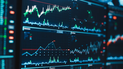 Poster - Close Up Footage of a Computer Monitor Screen with Real-Time Stocks, Commodities and Exchange Market Charts and Tickers on a Multi-Display Workstation in a Financial Business Office.