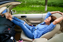 Mid Adult Woman Resting In Convertible Car