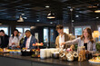 © Johnér - People choosing food in buffet