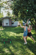 © Johnér - Women playing in garden