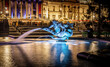 A night view of fountains of Trafalgar square, a public square in the City of Westminster, Central London