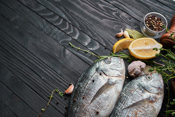 Wall Mural - fish on wooden board ingredients lemon fresh food sea food