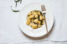 Plate Of Ready-to-eat Italian Gnocchi Dumplings With Grated Parmesan Cheese