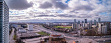 Fototapeta Londyn - don valley parkway Toronto skyline in the fall with green grass and clouds