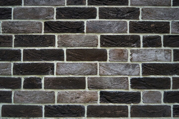 Wall Mural - Brick wall made of textured decorative brick.