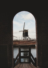 Dutch Windmill Between Black Arch
