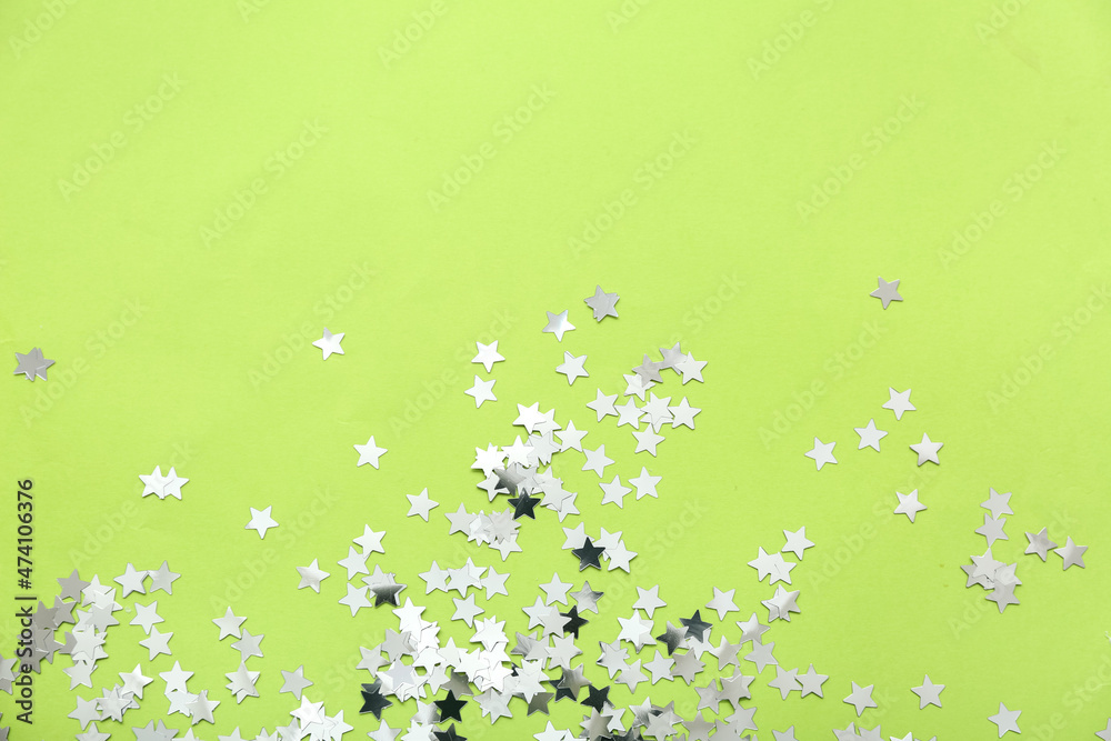 Beautiful confetti on green background