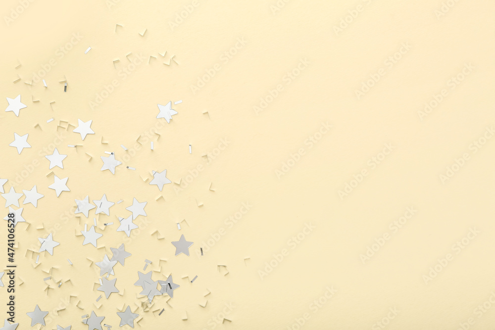 Beautiful confetti on beige background