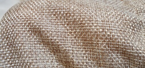 Burlap texture. Burlap material background and texture. Brown mesh material.
