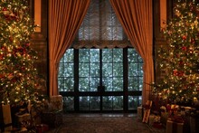 A Beautiful Room With Large Glass Window, Tall Curtains And Christmas Trees