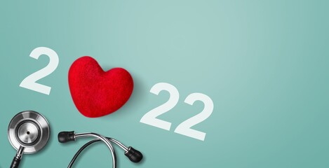 Poster - 2022 with Red heart with a stethoscope, heart health, health insurance concept,