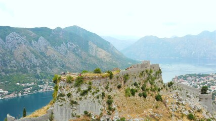 Wall Mural - Sunset view at the top of St John (San Giovanni) Fortress and Castle, Old Town, Kotor, Bay of Kotor, Montenegro.