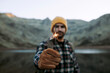 © ADDICTIVE STOCK - Man with sparkler near lake