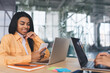 © BullRun - Business women working on laptops in office