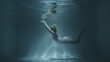 © davstudio - beautiful girl in a white dress sinks to the bottom