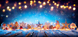 Fototapeta Na sufit - Christmas Decoration On Wooden Table In Blue Abstract Defocused Backdrop