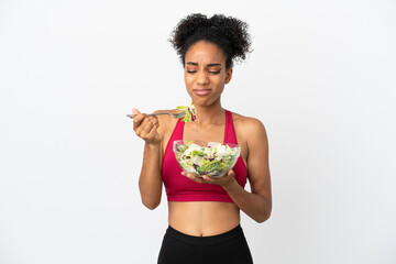 Sticker - Young african american woman with salad isolated on white background holding a bowl of salad with sad expression