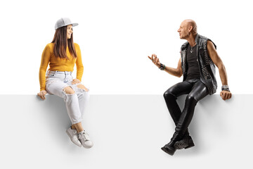 Poster - Punk talking to a female teenager while sitting on a blank panel