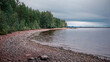 Beach and lakeshore with forest at Lake Siljan in Dalarna, Sweden.
