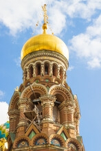 Golden Dome Of The Church Of The Savior On Blood Against Blue Sky Background At Saint Petersburg, Russia. Restoration Work In Progress