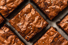 Close Up Of Salted Chocolate Brownies Cut Into Squares.