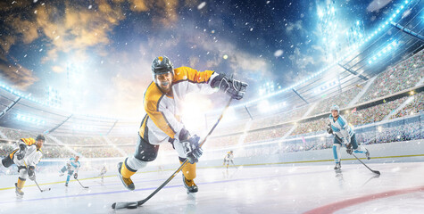 Wall Mural - Hockey player in helmet and gloves at the winter stadium. Sport concept. Athlete in action. Winter