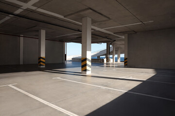 Empty open car parking near sea on sunny day