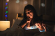 © chokniti - young Asian mother and little daughter girl on bed, cozy love sleepy at childhood home, at night