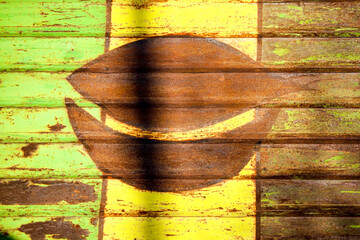 Wall Mural - Rusty striped metal background with green and yellow paint.