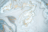 Fototapeta  - Natural luxury. Tiffany blue. Abstract ocean- ART. Style incorporates the swirls of marble or the ripples of agate. Very beautiful blue paint with the addition of gold powder.	
