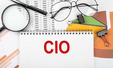 Poster - Text CIO on white paper notebook on the diagram. Business concept