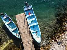 Aerial View Of Two Blue Boats In Mooring