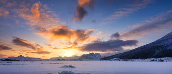 Wall Mural - panoramic view of the sunset sky. winter landscape. the lofoten islands, norway. high resolution pho