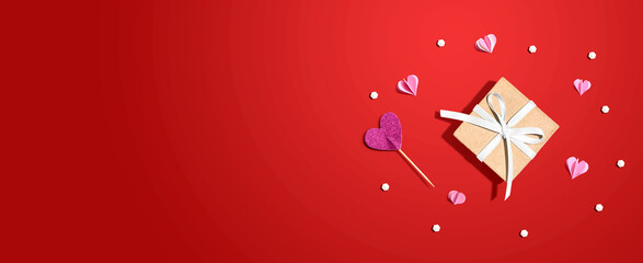 Wall Mural - Valentines day or Appreciation theme with a gift box and paper craft hearts