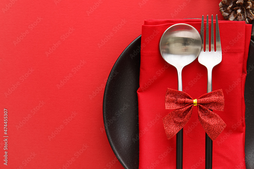 Beautiful Christmas table setting on red background