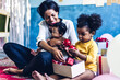 © Art_Photo - Portrait of enjoy happy love family african american mother playing with adorable little african american baby.Mom touching with cute girl moments good time in a white bedroom.Love of black family