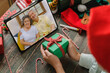 © weedezign - Christmas and new year  video call with famliy with tablet together at home