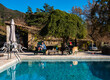 © Mike Workman - Eating breakfast poolside at bed and breakfast in late autumn