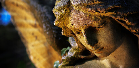 Wall Mural - Angel. Close up fragment of an ancient statue.