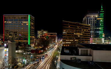 Wall Mural - Streaking car light through the streets of downtown Boise